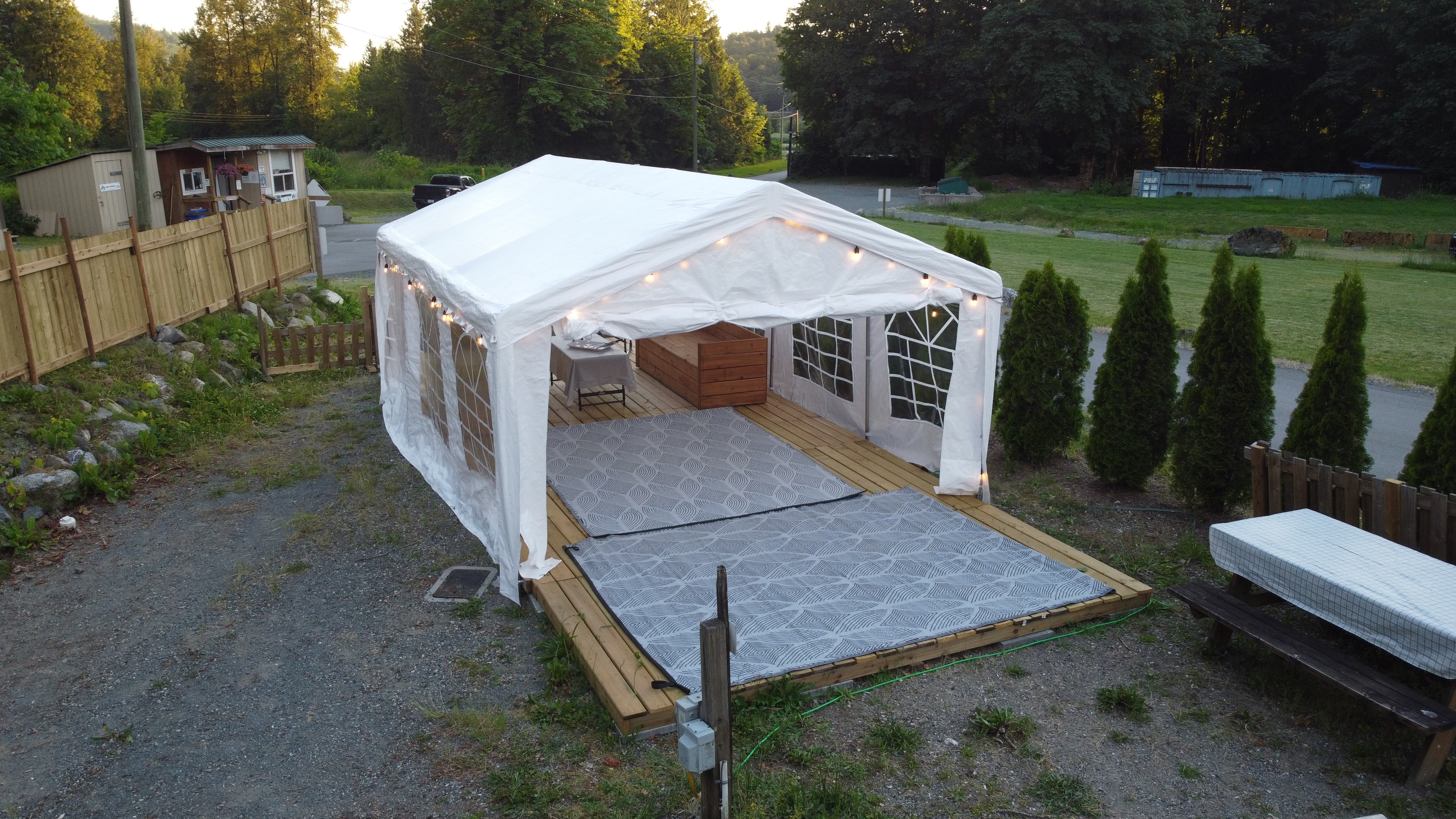 Aerial view of the Pavilion's deck and tent tucked into the resort grounds